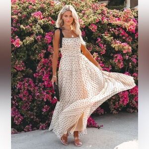 Polka dots dress by Vici in size small. Brand new!